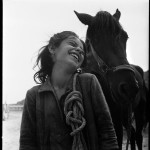 A peasant girl leading her family’s horse back from the fields to her cave home. Matera, Basilicata, Italy. 1948. © David Seymour / Magnum Photos